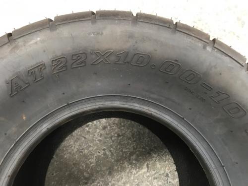 QUAD ROAD TIRE AT 22 X 10.00-10IN